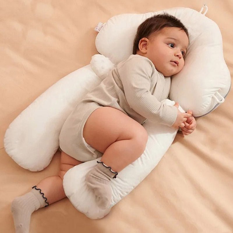 Baby lying on a soft support pillow