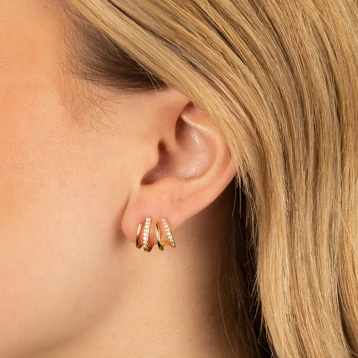 Orecchini attorcigliati — Silhouette elegante in oro o argento