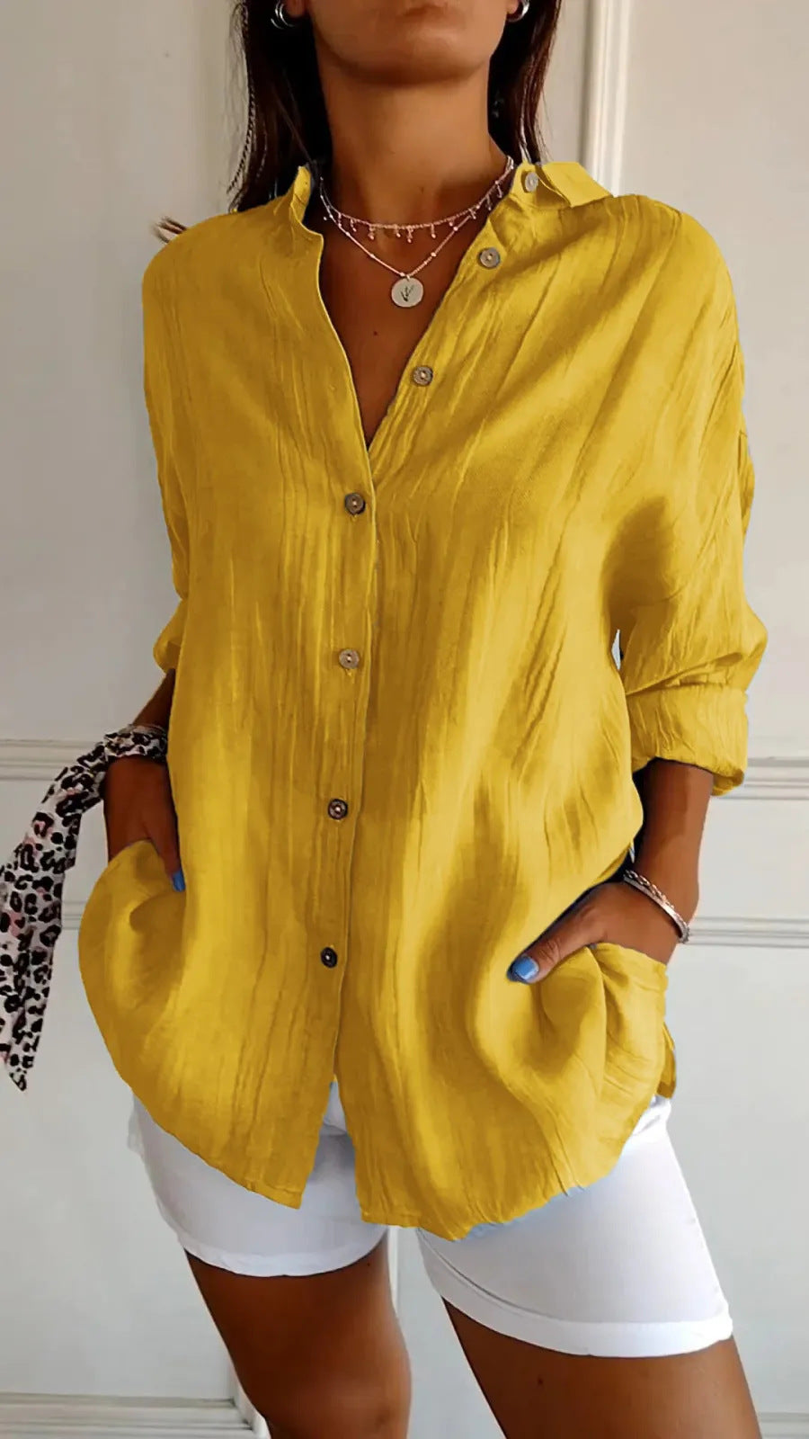 Chemise longue plissée à col cranté