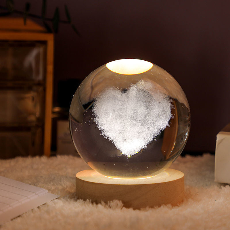Luz nocturna de cristal con sistema solar 3D iluminado