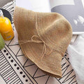 Foldable Straw Hat — Adjustable Fit, Decorative Bow & Wire Rim