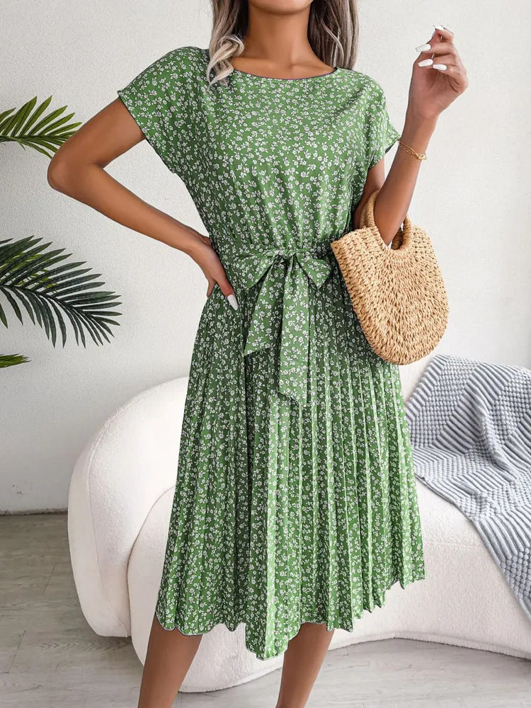 Robe fluide imprimée à manches courtes, col noué & jupe plissée – Printemps / Été