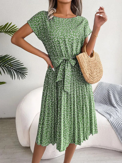 Robe fluide imprimée à manches courtes, col noué & jupe plissée – Printemps / Été