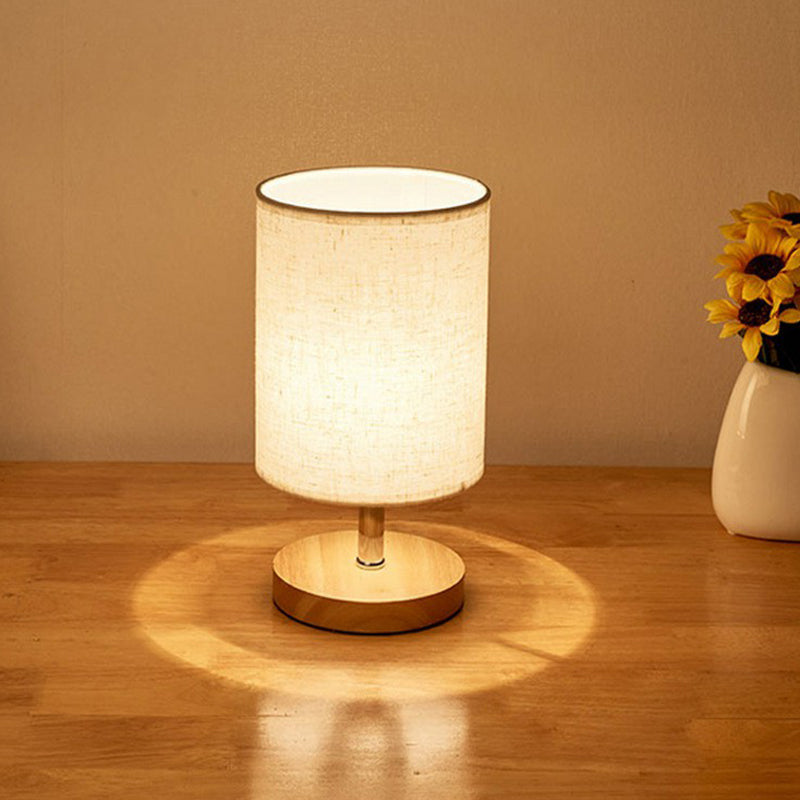 LinenWood minimalistisk bordslampa — bas i naturligt trä, mjuk linneskärm