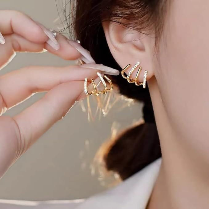 Orecchini attorcigliati — Silhouette elegante in oro o argento
