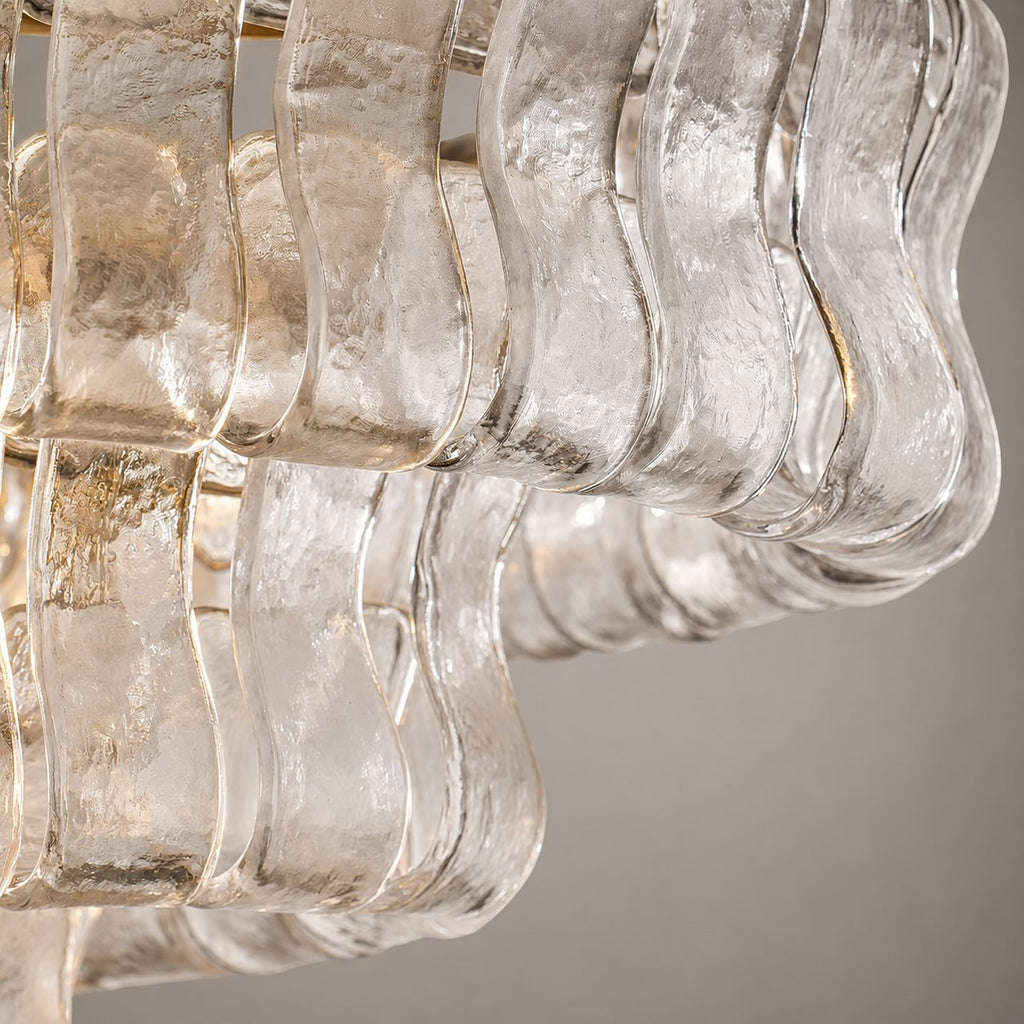 Modern oval takkrona — justerbar sänkhöjd, stålram och böjt glas, alternativ med 5 eller 12 glödlampor
