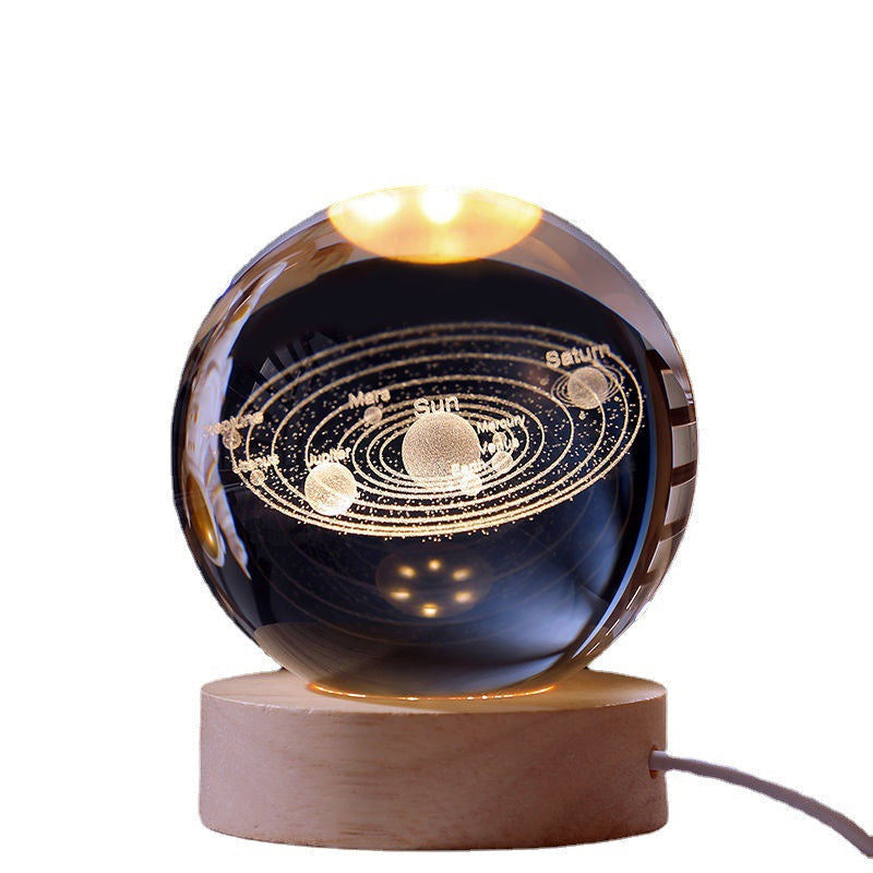Luz nocturna de cristal con sistema solar 3D iluminado