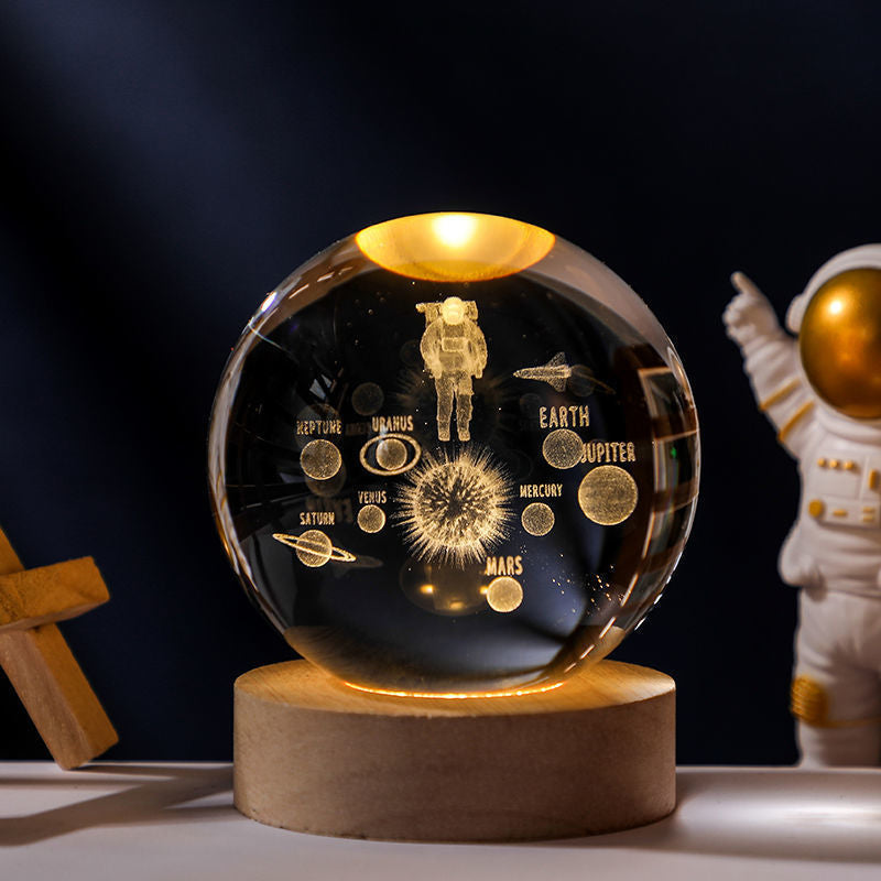 Luz nocturna de cristal con sistema solar 3D iluminado