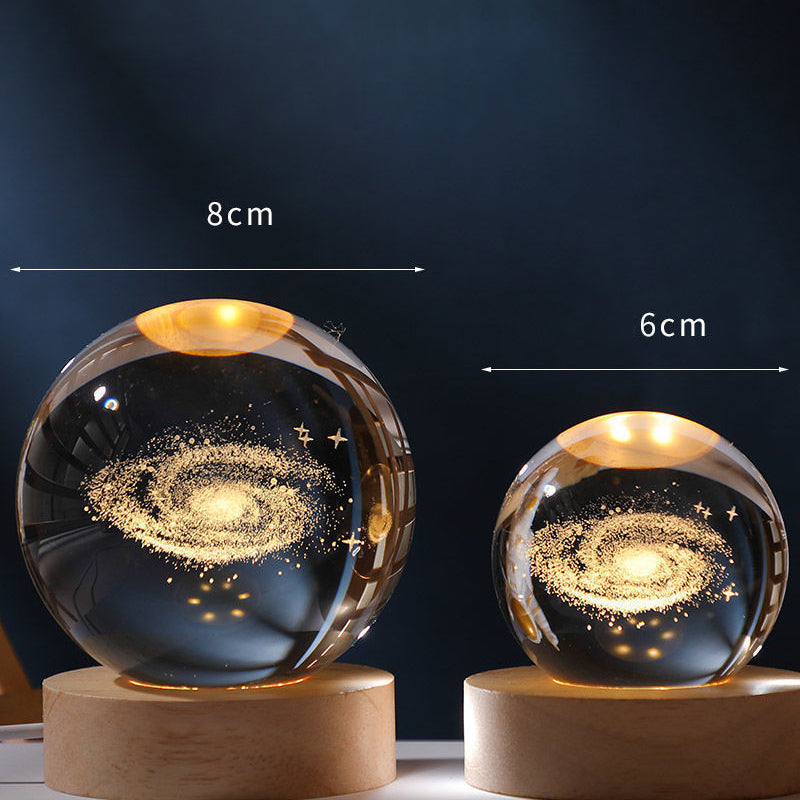 Luz nocturna de cristal con sistema solar 3D iluminado