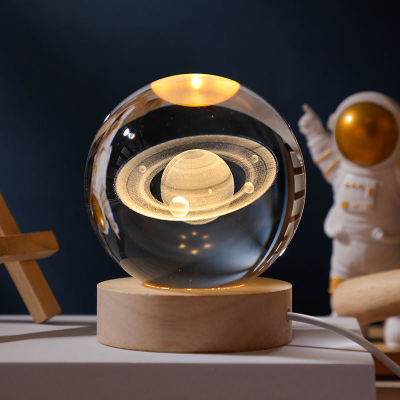 Luz nocturna de cristal con sistema solar 3D iluminado