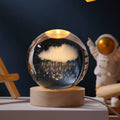 Luz nocturna de cristal con sistema solar 3D iluminado