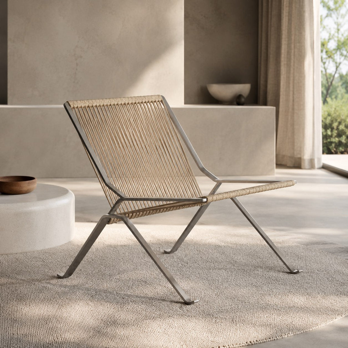 Sedia da relax moderna — struttura in acciaio inossidabile, seduta in corda intrecciata, schienale inclinato