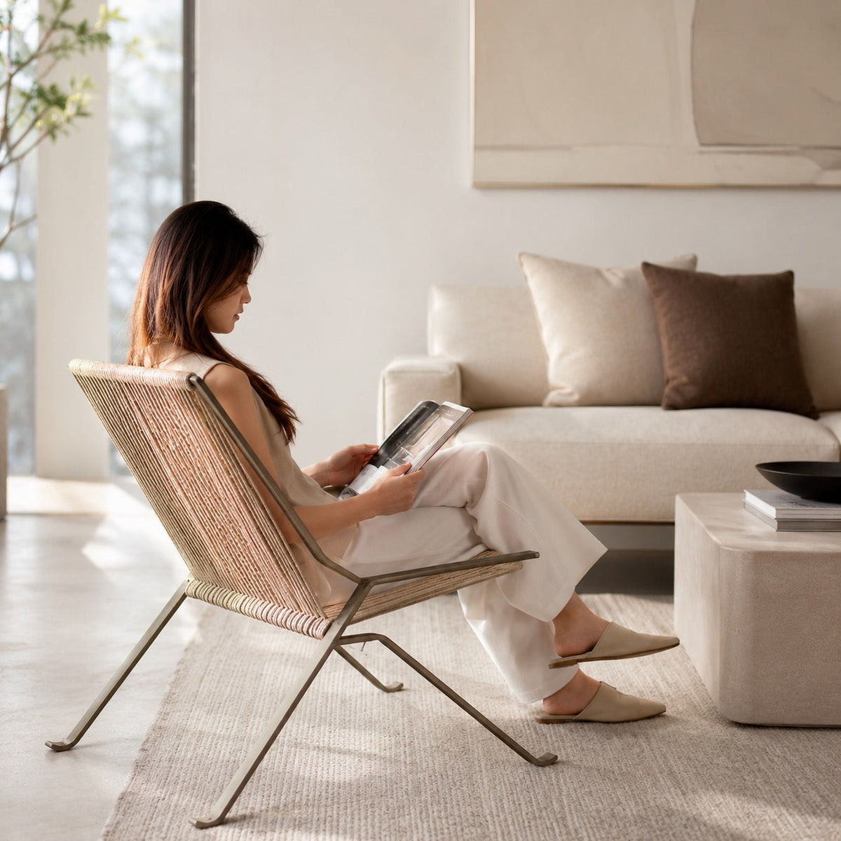 Sedia da relax moderna — struttura in acciaio inossidabile, seduta in corda intrecciata, schienale inclinato