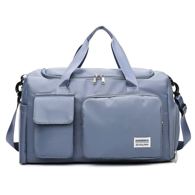 Saco de viagem com vários bolsos e compartimento separado para calçado