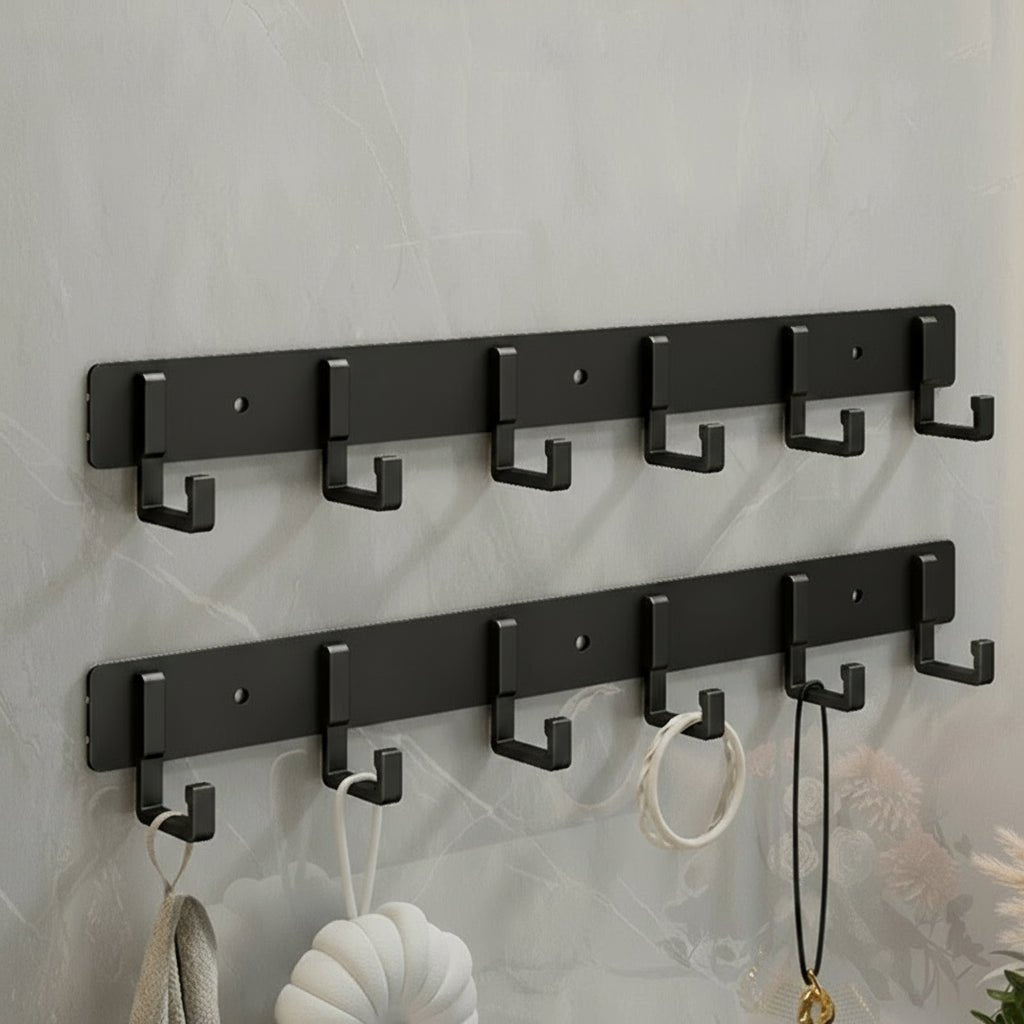 Appendiabiti da parete, ganci neri, design minimalista robusto
