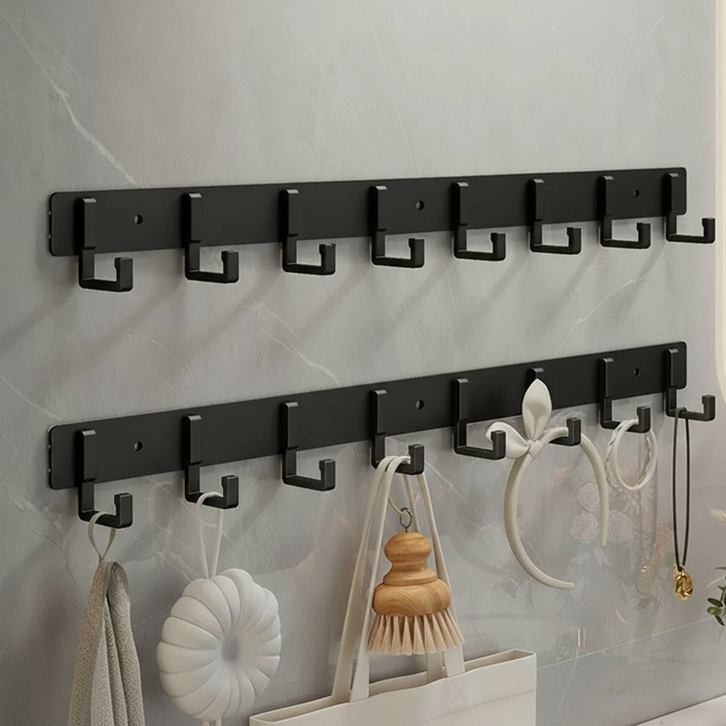 Appendiabiti da parete, ganci neri, design minimalista robusto