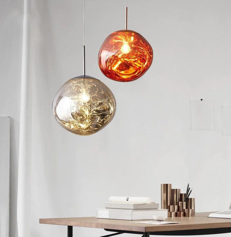Lámpara colgante moderna de acrílico con diseño de lava sobre la mesa del comedor | boxzora