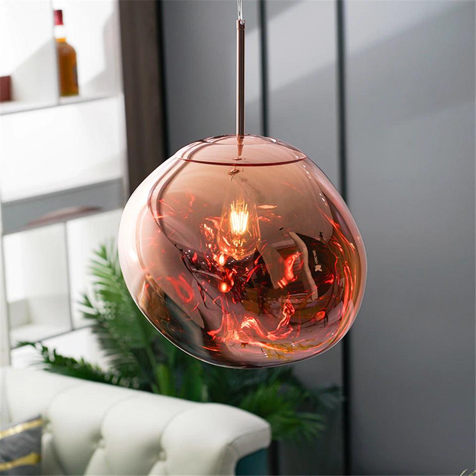 Lámpara colgante moderna de acrílico con diseño de lava sobre la mesa del comedor | boxzora