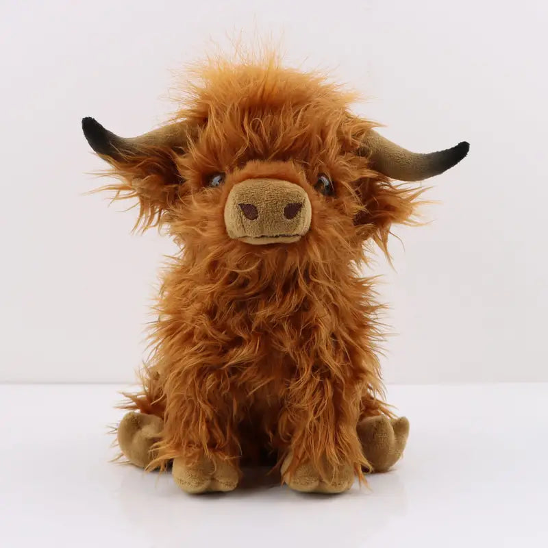 Mucca Highland marrone e bianca da coccolare — peluche morbido e confortevole