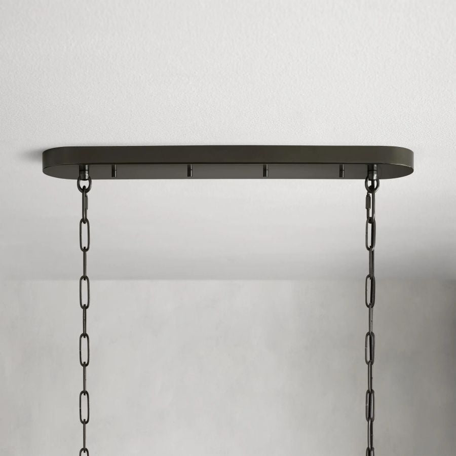 Modern oval takkrona — justerbar sänkhöjd, stålram och böjt glas, alternativ med 5 eller 12 glödlampor