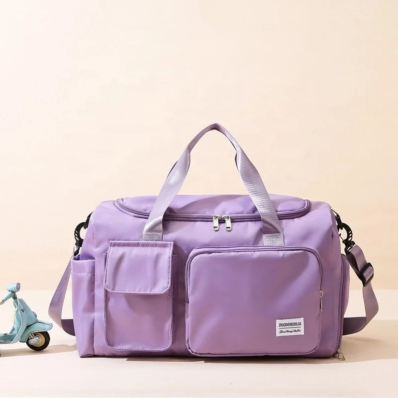 Saco de viagem com vários bolsos e compartimento separado para calçado