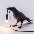 Lámpara de pared Raven — escultura de ave a tamaño real, luces cálidas de hadas