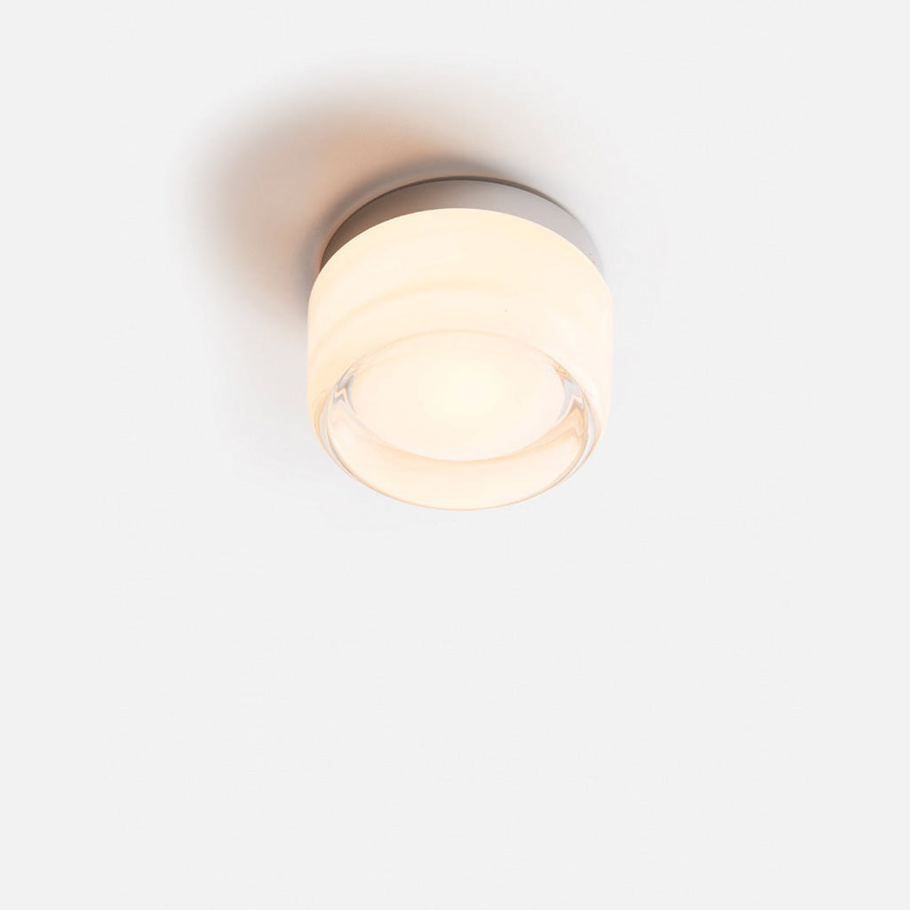 Lámpara de pared LumièreLux con relieve — estructura metálica moderna y pantalla de vidrio