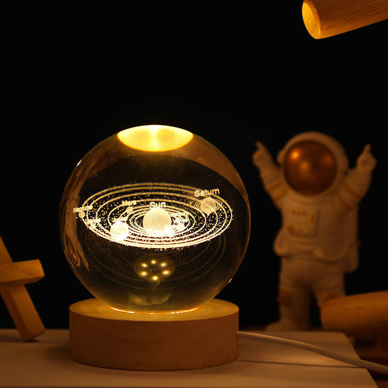 Luz nocturna de cristal con sistema solar 3D iluminado