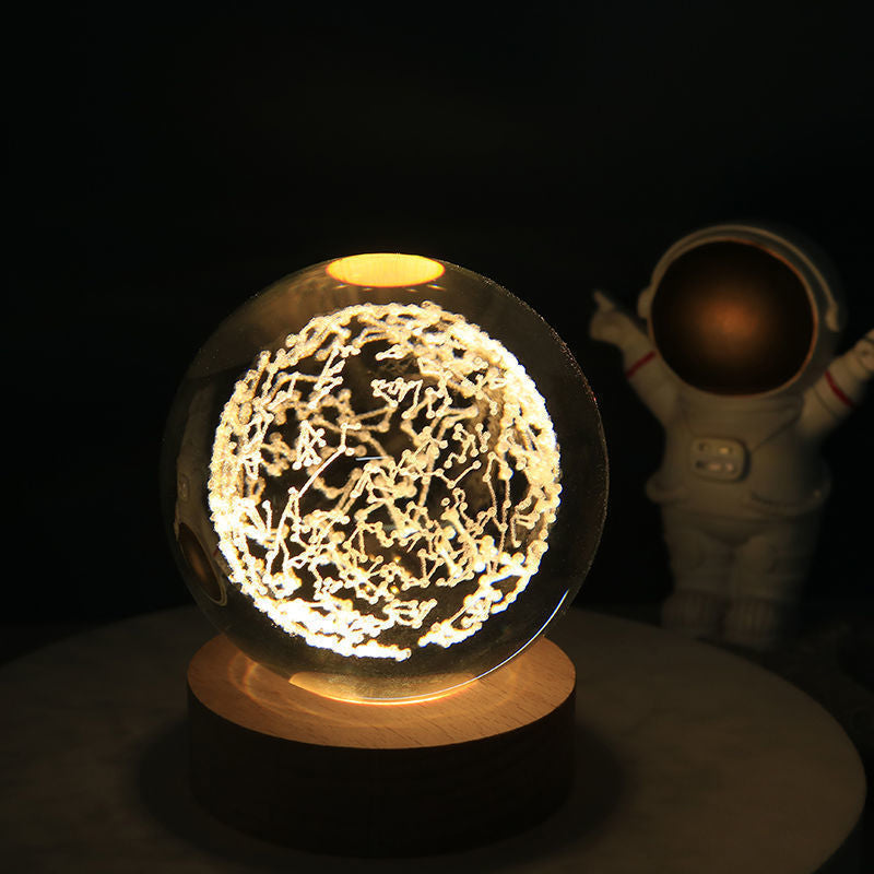 Luz nocturna de cristal con sistema solar 3D iluminado