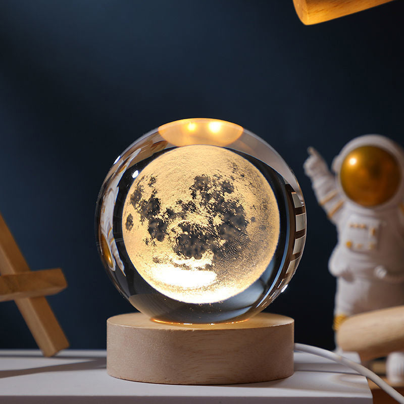Luz nocturna de cristal con sistema solar 3D iluminado