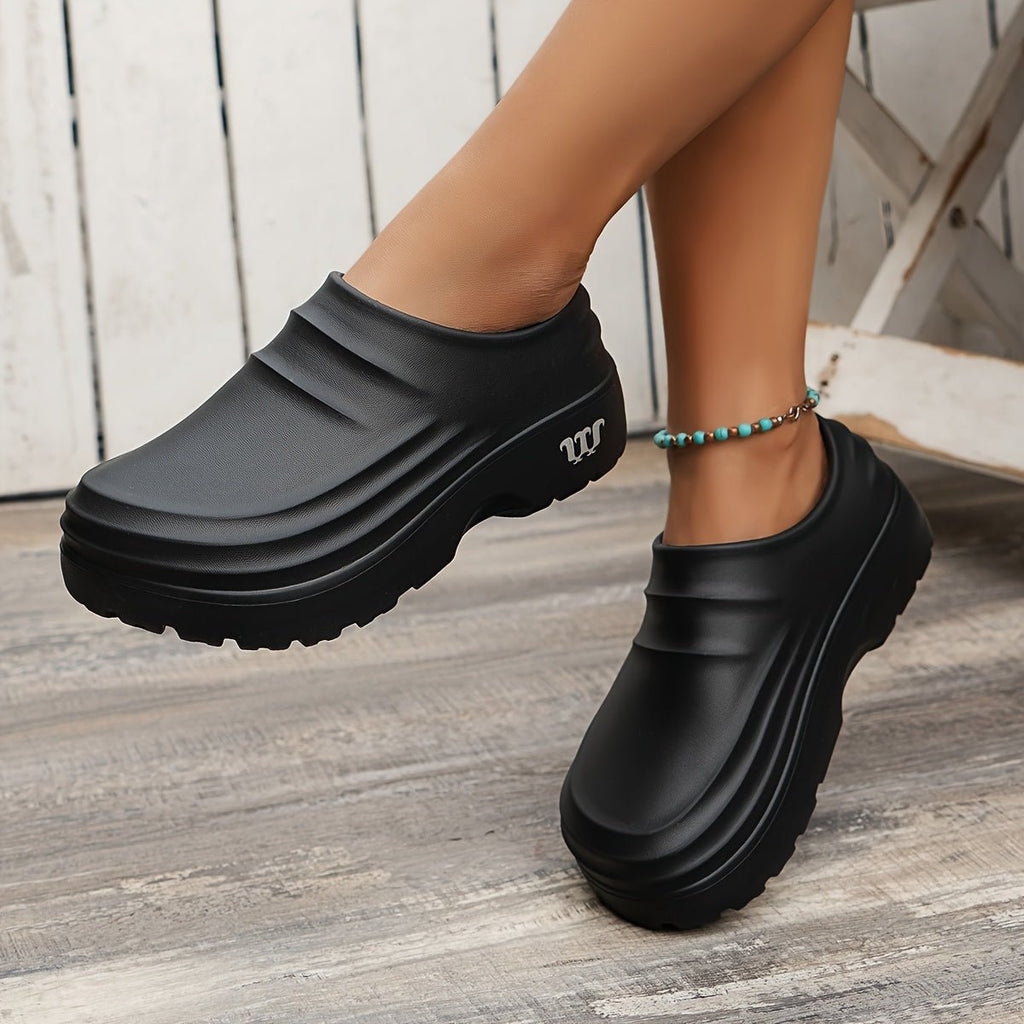 Vattenavvisande vadderade slip-on-träskor