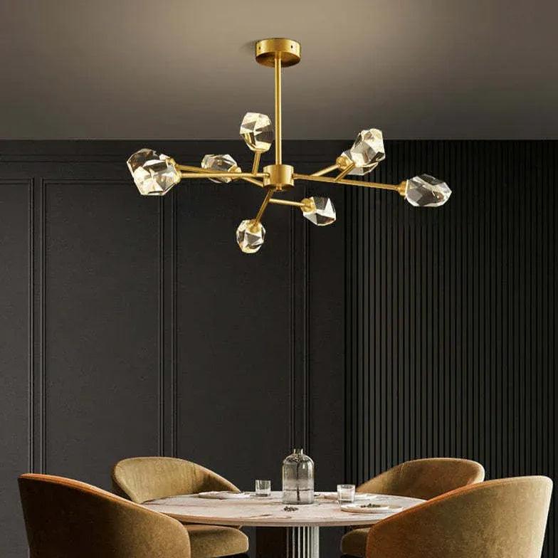 Moderne lysekrone i messing og krystal med molekyledesign til spisebordet | boxzora