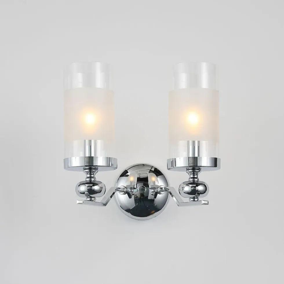 Moderne vegglamper i jern og glass med lysestakedesign til stuen | boxzora