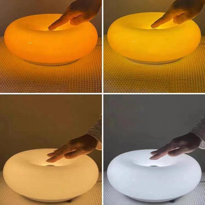 Nordisk oransje vegglampe i glass med smultringdesign | boxzora