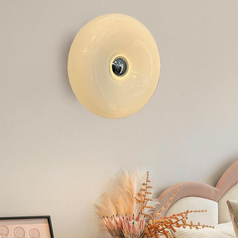 Nordisk oransje vegglampe i glass med smultringdesign | boxzora