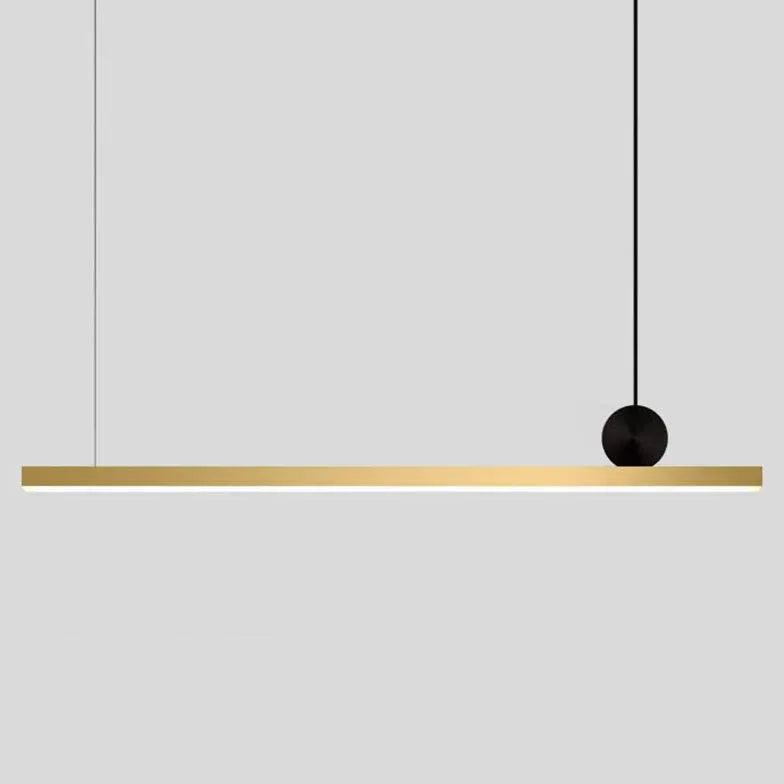 Minimalistické lineární závěsné světlo nad jídelní stůl | boxzora