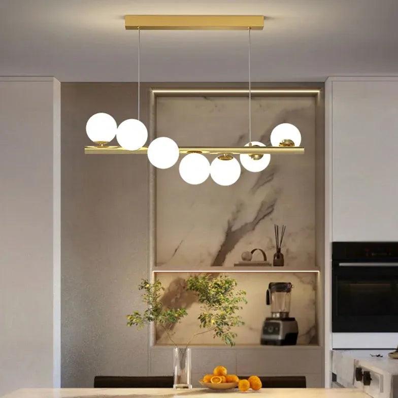 Luxuriöse lineare Pendelleuchte mit mehreren weißen Glasköpfen | boxzora