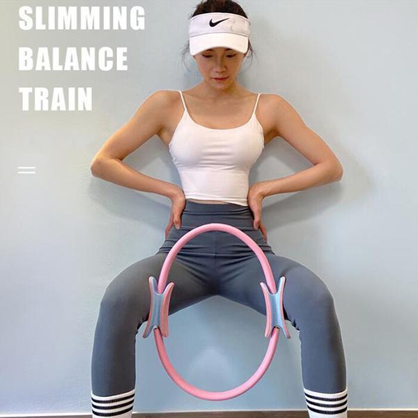 Pilatesring – träningsutrustning för bål, armar, bröst och ben