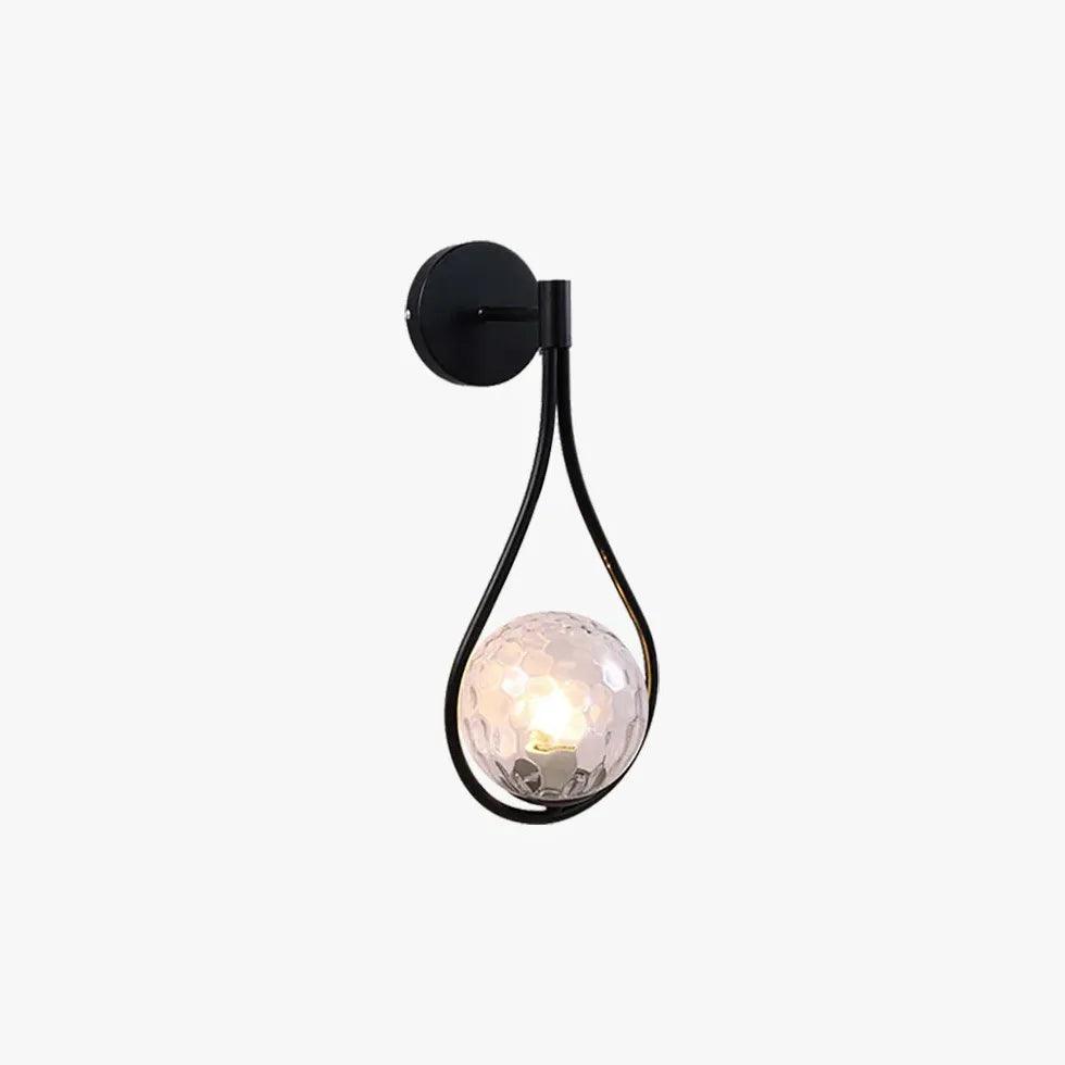Nordisk LED-vegglampe med glasskule i svart til nattbord | boxzora