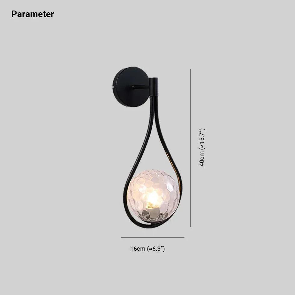 Nordisk LED-vegglampe med glasskule i svart til nattbord | boxzora