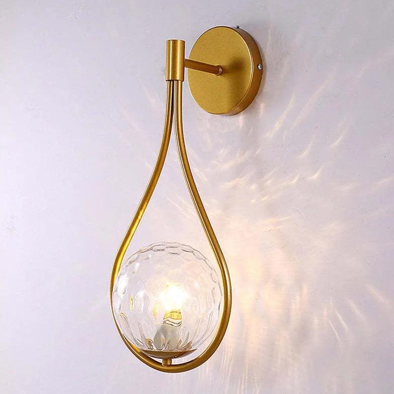 Nordisk LED-vegglampe med glasskule i svart til nattbord | boxzora