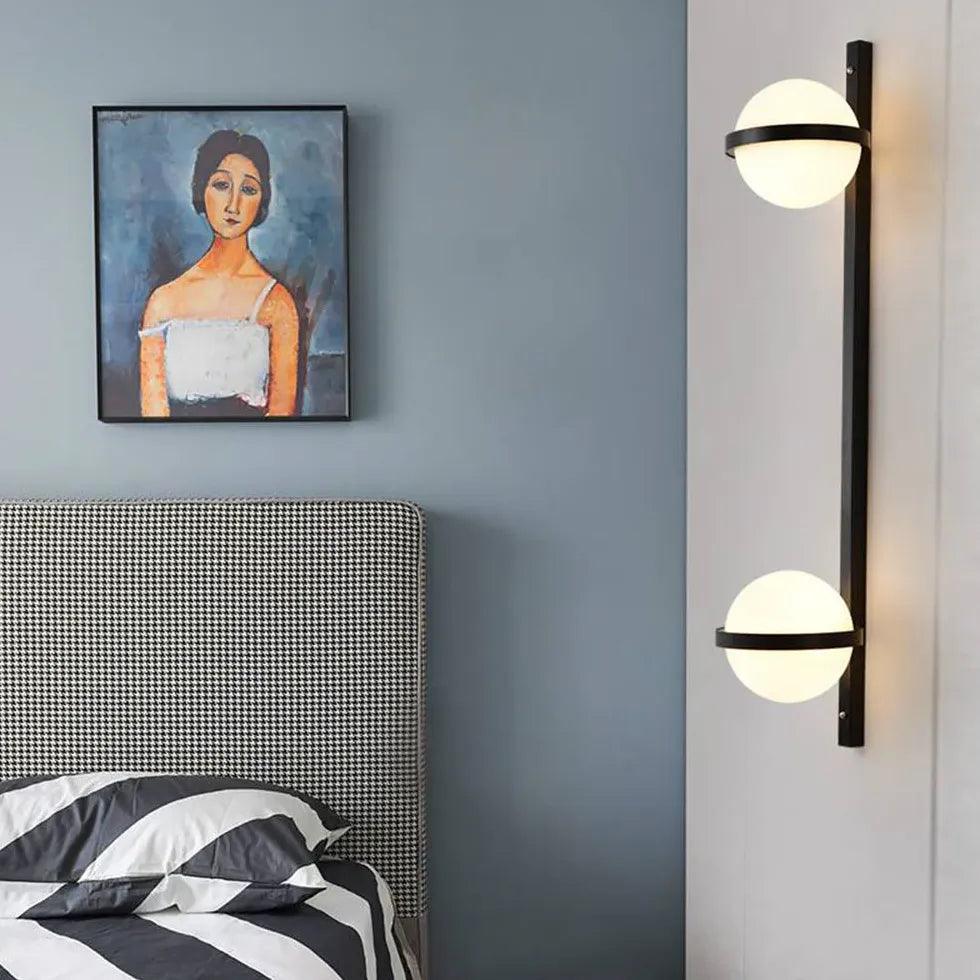 Moderne zwarte wandlamp met groene planten | boxzora