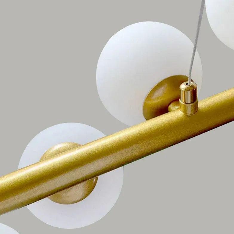 Luxuriöse lineare Pendelleuchte mit mehreren weißen Glasköpfen | boxzora